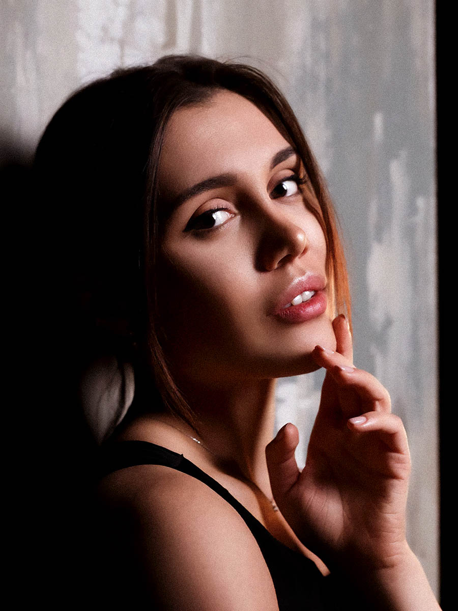 Styled portrait session with dramatic studio lighting 17