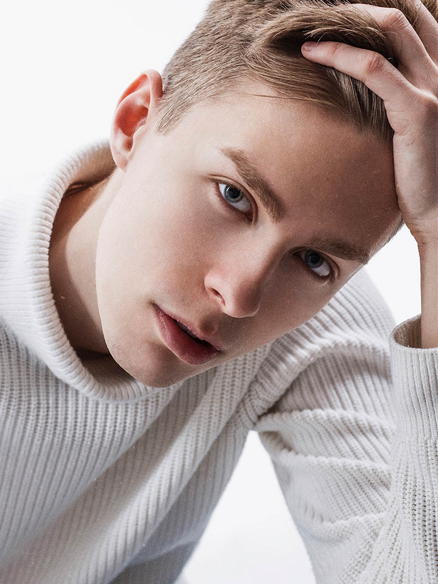 Conceptual male portrait with vivid red studio lighting 11