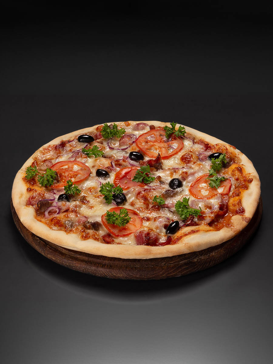 Restaurant menu photography showing a plated main dish 16