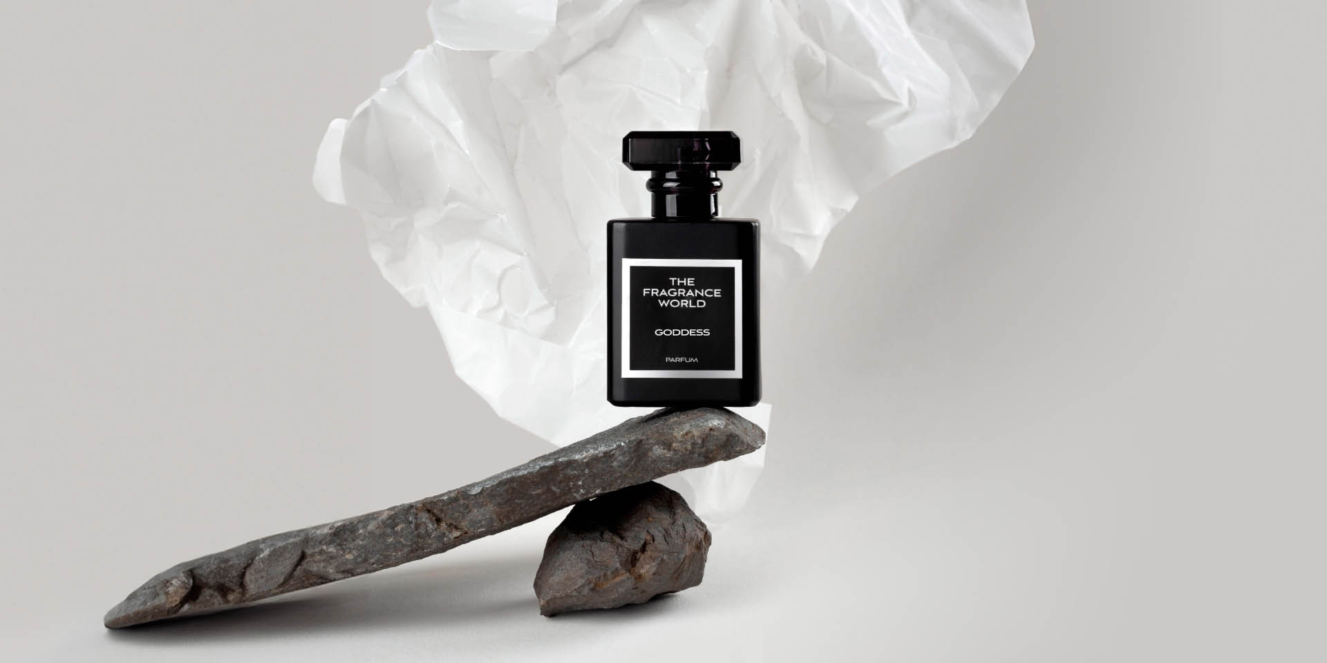Creative fragrance campaign image featuring multiple perfume bottles 9