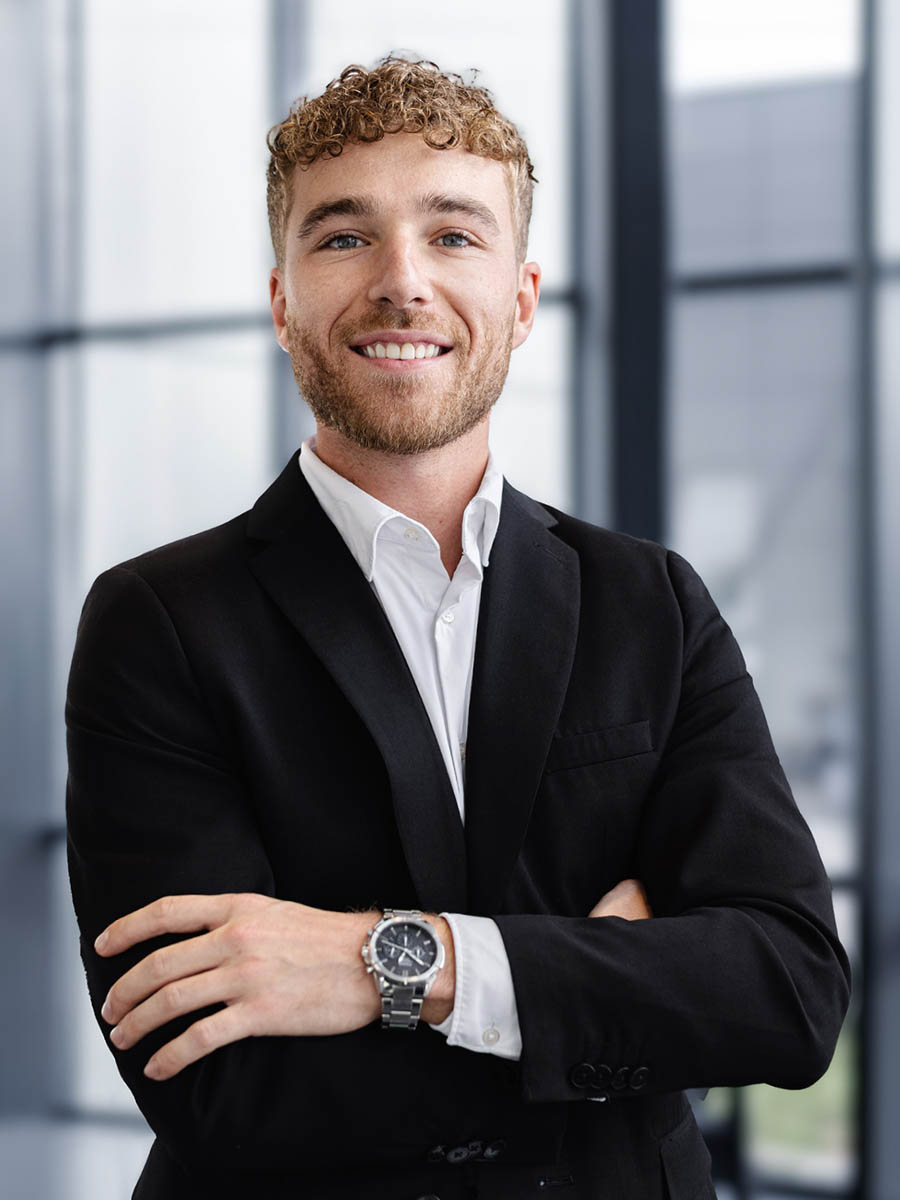 employee headshot with consistent lighting and neutral composition 3