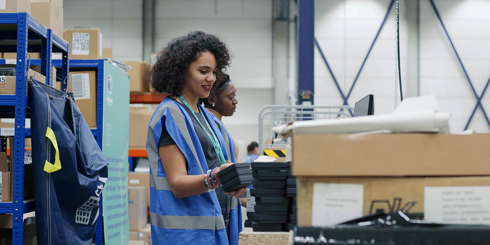 Corporate videographer filming inside a fulfilment warehouse 7