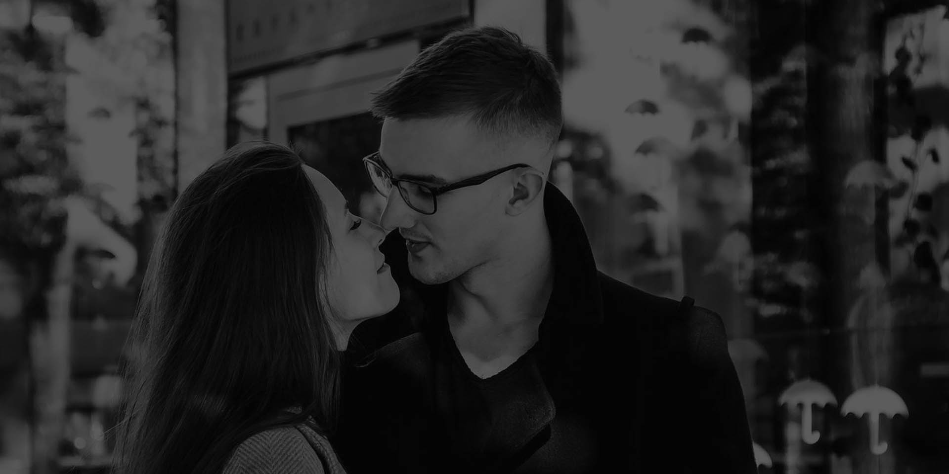 Urban couple portrait using a parked car as a foreground element 26