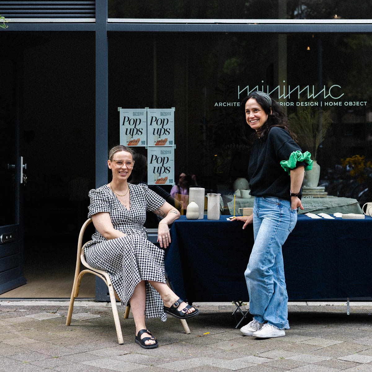 Artisan presenting handmade ceramics during an Eindhoven pop-up event 3