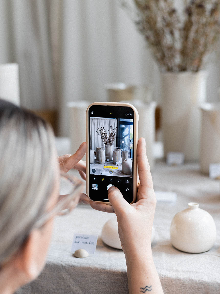 Event photography of ceramic objects displayed inside Minimuc Design Studio 12