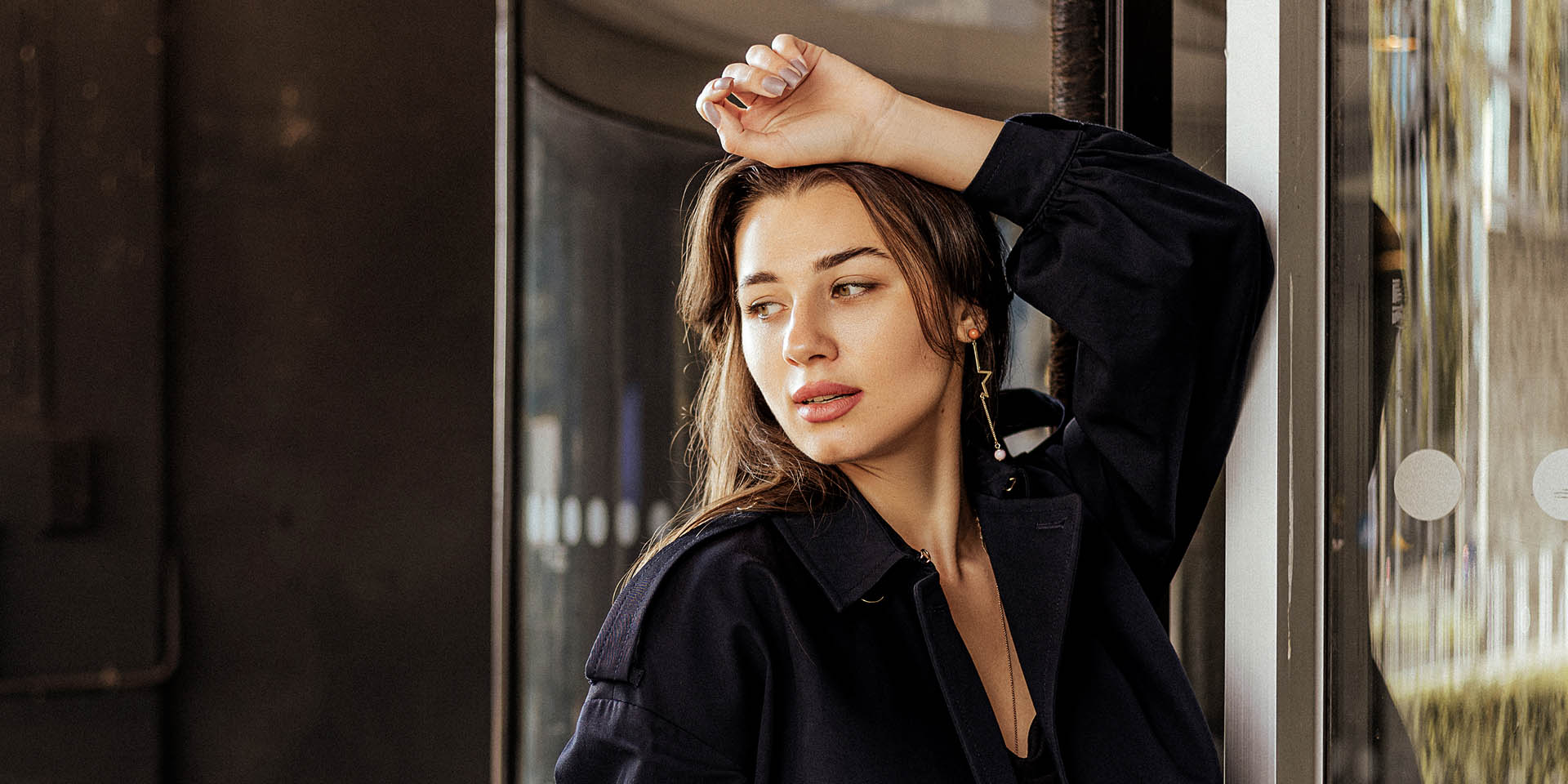 Cinematic model portrait framed by geometric urban architecture 3