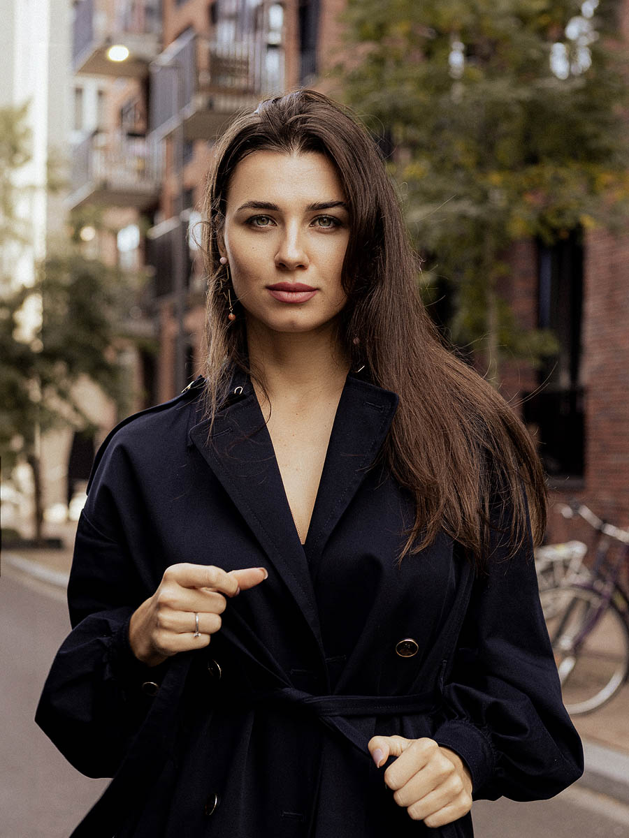 Female model photographed against modern building lines in Maastricht 5