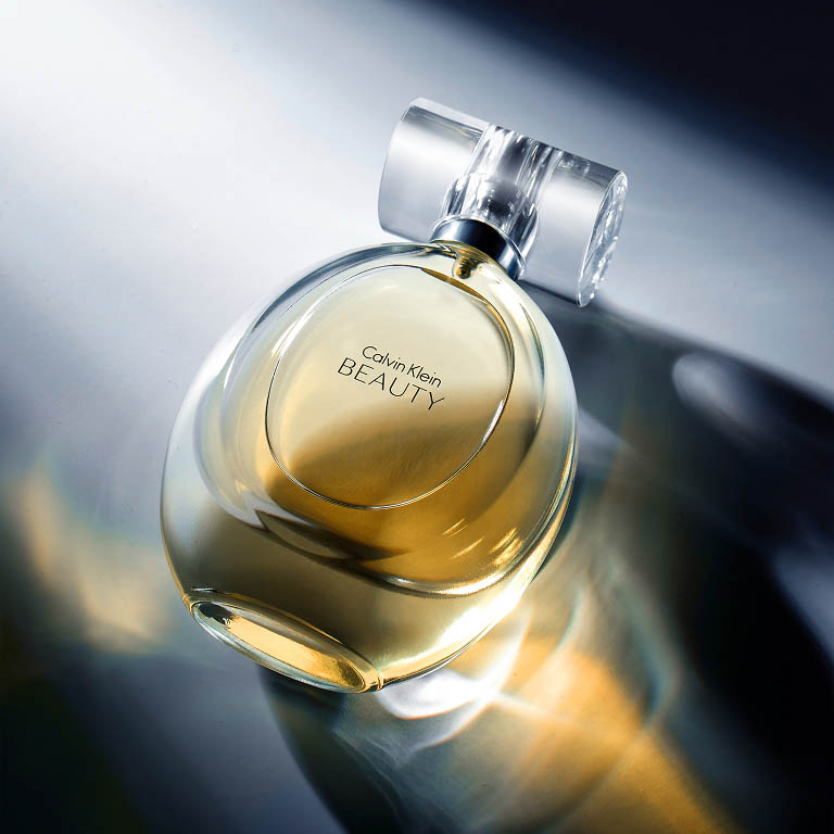 perfume bottle and packaging photographed as a complete product set 12